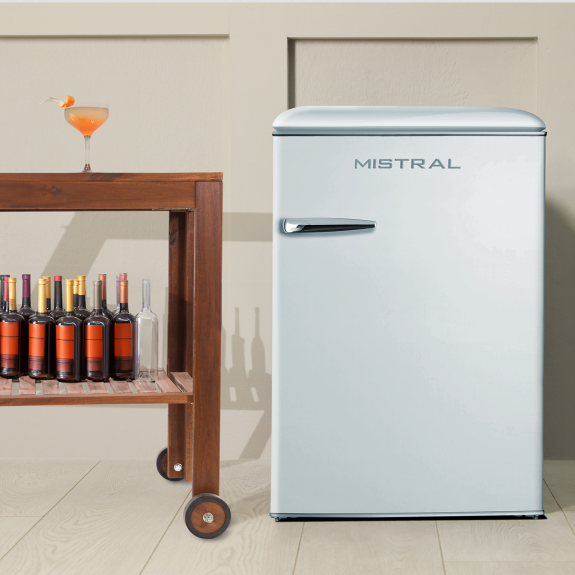 Mistral 117L Bar Fridge in white with bottles of wine on the left